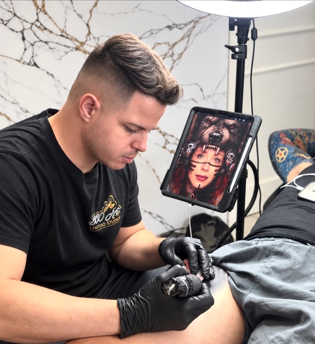 Rafa working on a tattoo design